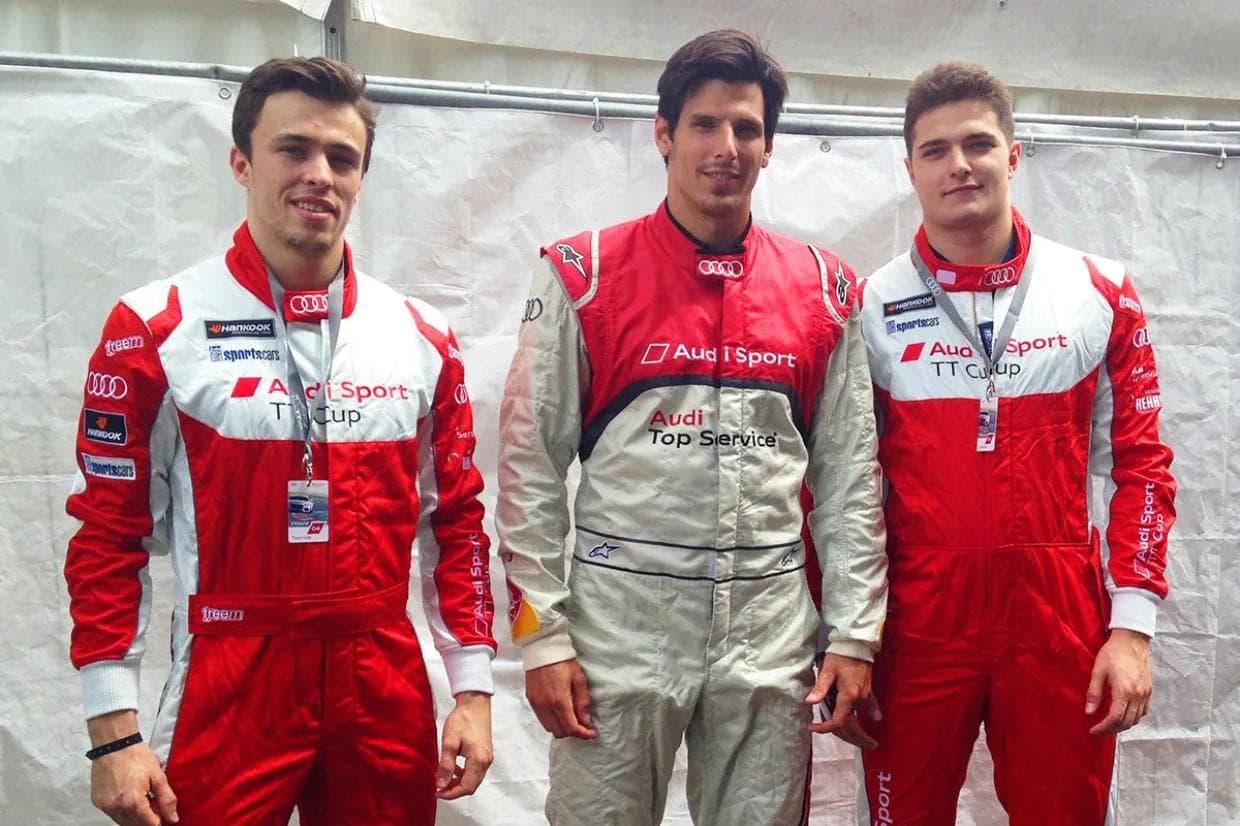 Fabio Wagner, Tomas Kubalik und Marc Schmidpeter in ihren Rennoveralls auf dem Norisring (Foto: Audi)